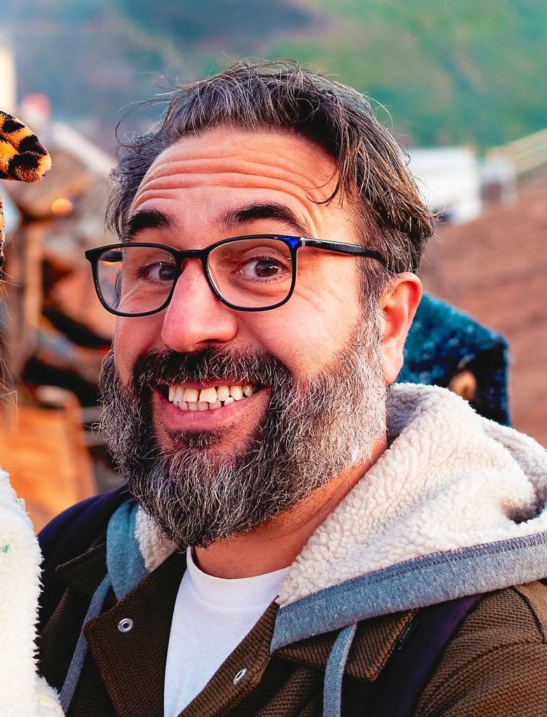 Antony (Ant), co-founder of LOOK Creative, smiling outdoors.